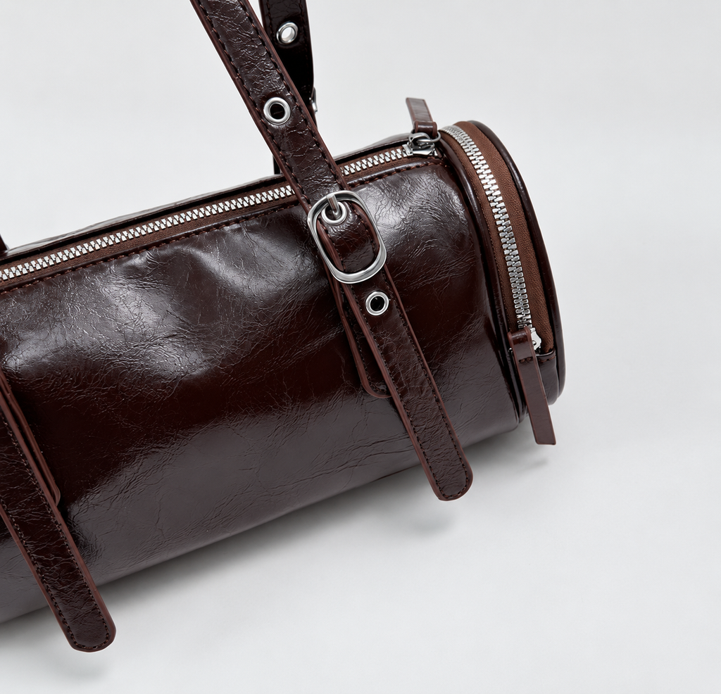 Barrel Shoulder Bag with Sleek Zippers and Buckle Accents