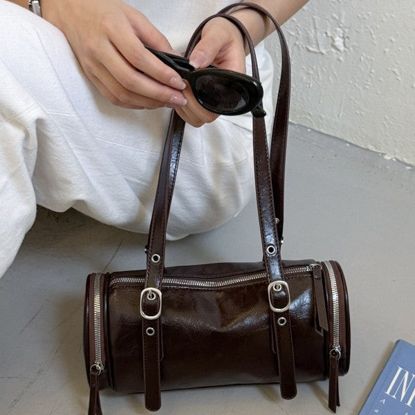 Barrel Shoulder Bag with Sleek Zippers and Buckle Accents