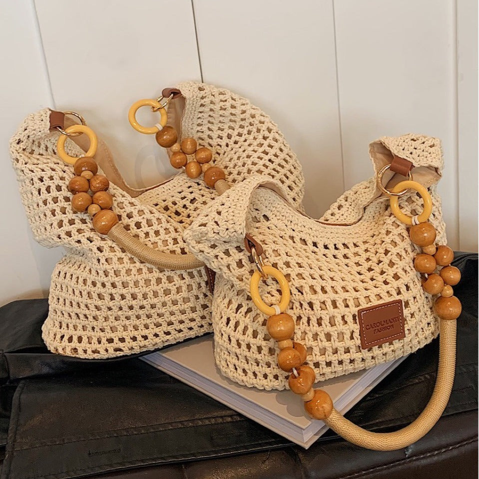 Seaside Vacation Beach Woven Bag For Women 2026 New Hollow Knitted Handbag Large Capacity Single Shoulder Armpit Bag