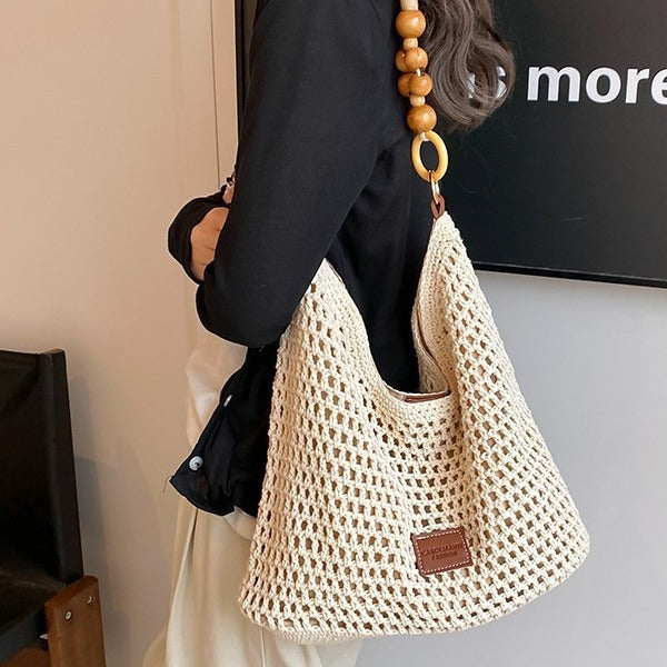 Seaside Vacation Beach Woven Bag For Women 2026 New Hollow Knitted Handbag Large Capacity Single Shoulder Armpit Bag