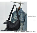 Textured Nylon Dumpling Crossbody Bag
