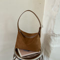 Minimalist Suede Hobo Bag with Adjustable Strap and Zipper