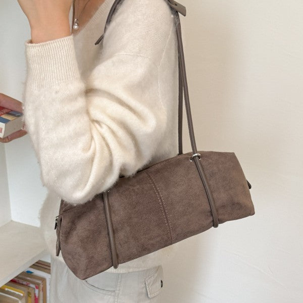 Soft Suede Barrel Shoulder Bag with Metal Accents and Zip Closure