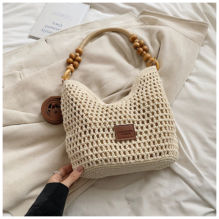 Seaside Vacation Beach Woven Bag For Women 2026 New Hollow Knitted Handbag Large Capacity Single Shoulder Armpit Bag