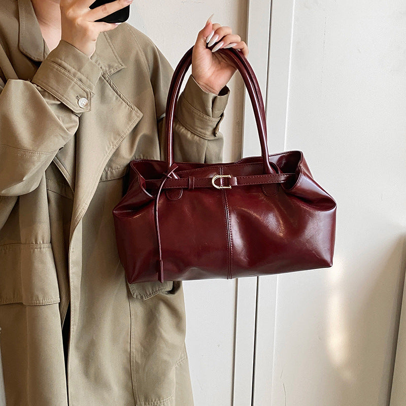 Glossy East-west Shoulder Bag with Elegant Belted Detailing