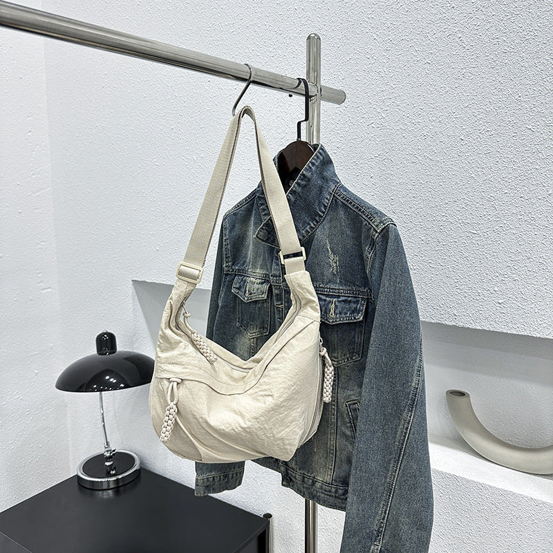 Textured Nylon Dumpling Crossbody Bag