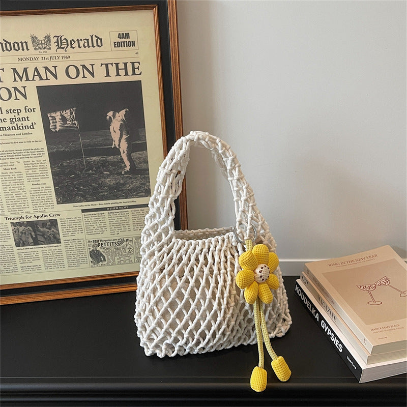 2026 New Korean Unique Hollow Mesh Wristlet Fashion Beach Handbag