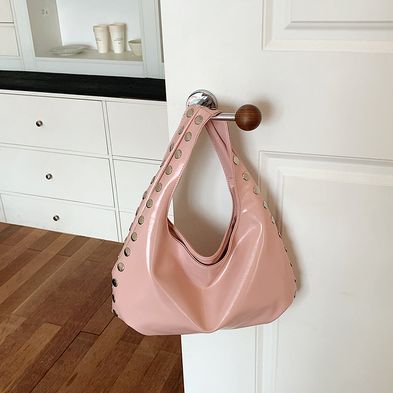 Glossy Hobo Shoulder Bag with Bold Metal Stud Detailing