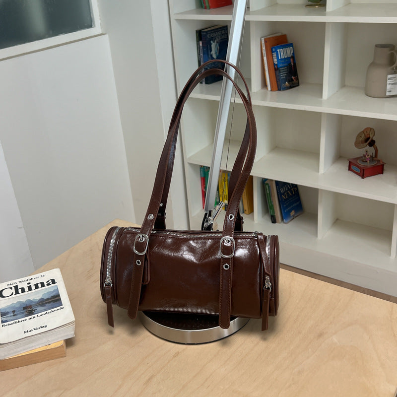 Barrel Shoulder Bag with Sleek Zippers and Buckle Accents