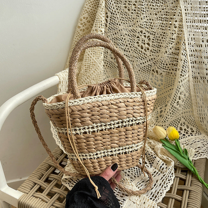 Women 2026 Summer New Vintage Straw Unique Handheld Woven Bucket Bag