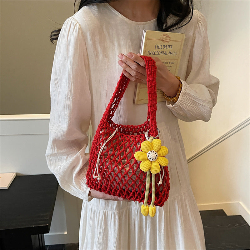 2026 New Korean Unique Hollow Mesh Wristlet Fashion Beach Handbag