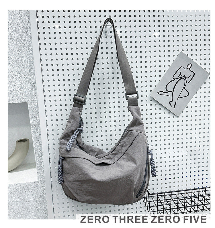 Textured Nylon Dumpling Crossbody Bag