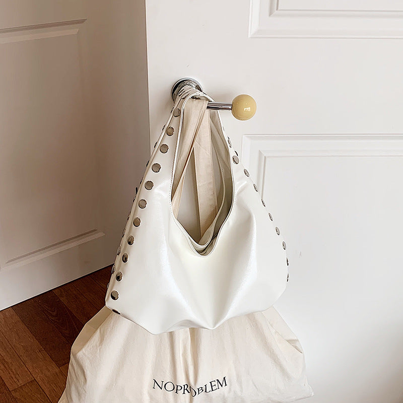 Glossy Hobo Shoulder Bag with Bold Metal Stud Detailing