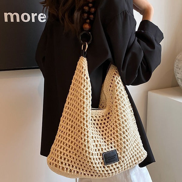 Seaside Vacation Beach Woven Bag For Women 2026 New Hollow Knitted Handbag Large Capacity Single Shoulder Armpit Bag