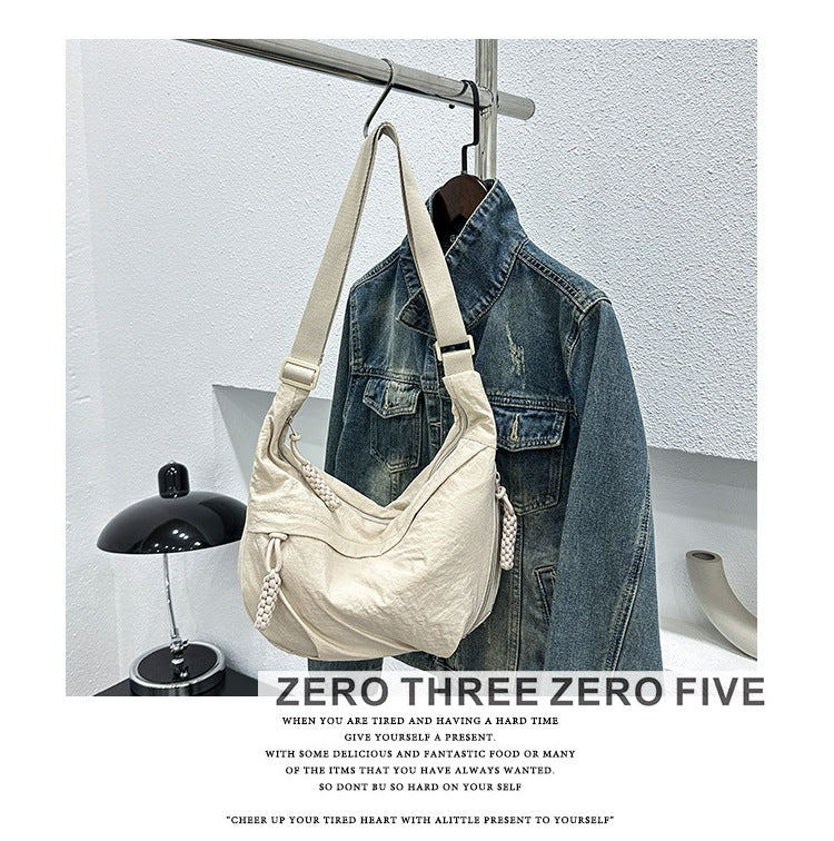 Textured Nylon Dumpling Crossbody Bag