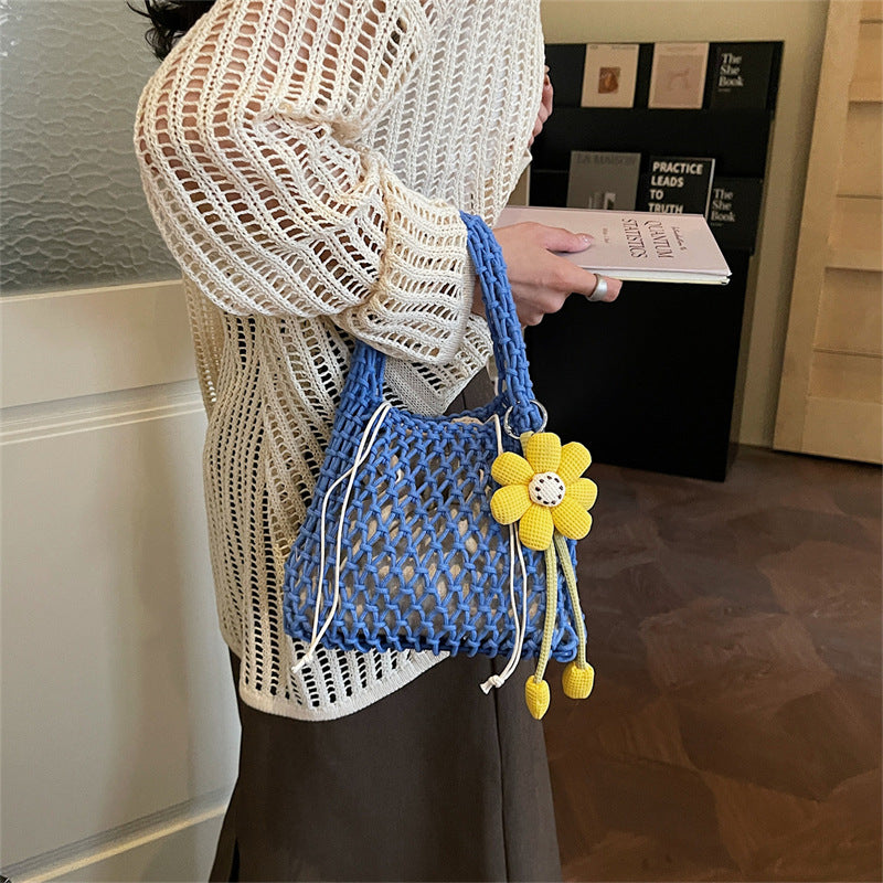 2026 New Korean Unique Hollow Mesh Wristlet Fashion Beach Handbag