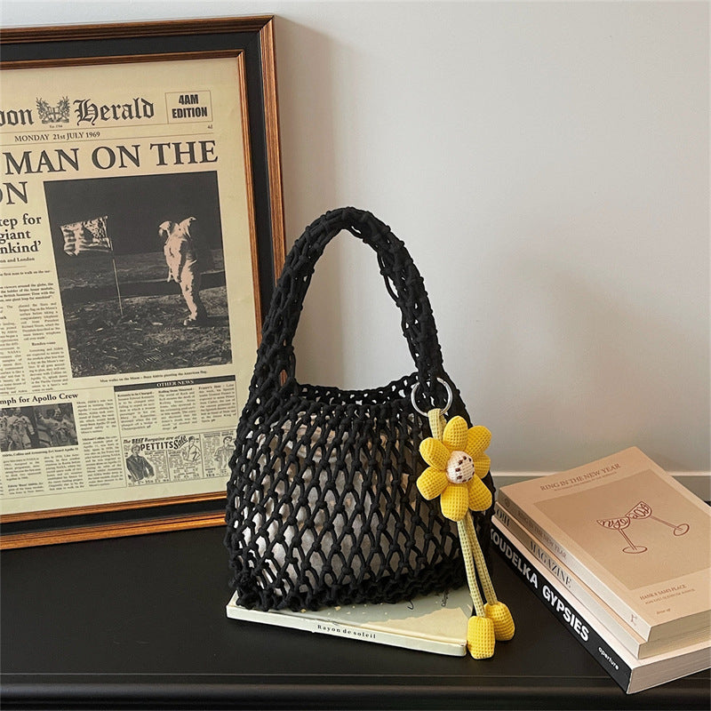 2026 New Korean Unique Hollow Mesh Wristlet Fashion Beach Handbag