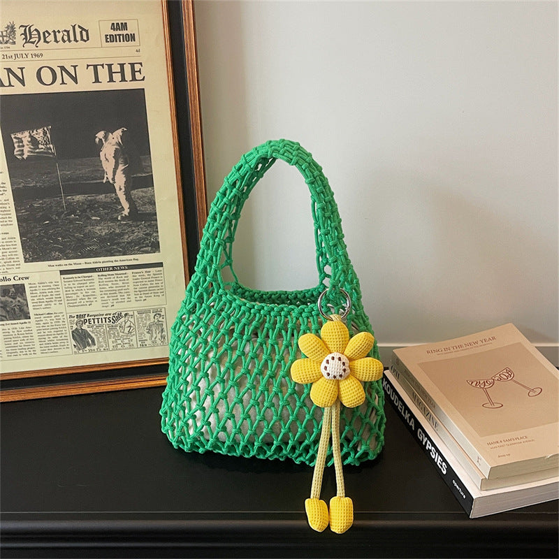 2026 New Korean Unique Hollow Mesh Wristlet Fashion Beach Handbag