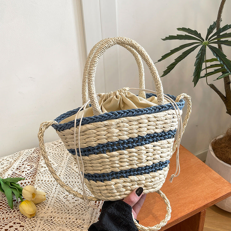 Women 2026 Summer New Vintage Straw Unique Handheld Woven Bucket Bag