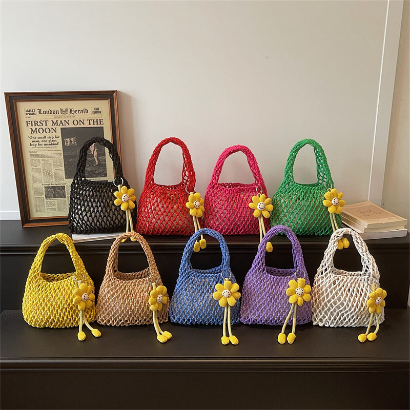 2026 New Korean Unique Hollow Mesh Wristlet Fashion Beach Handbag