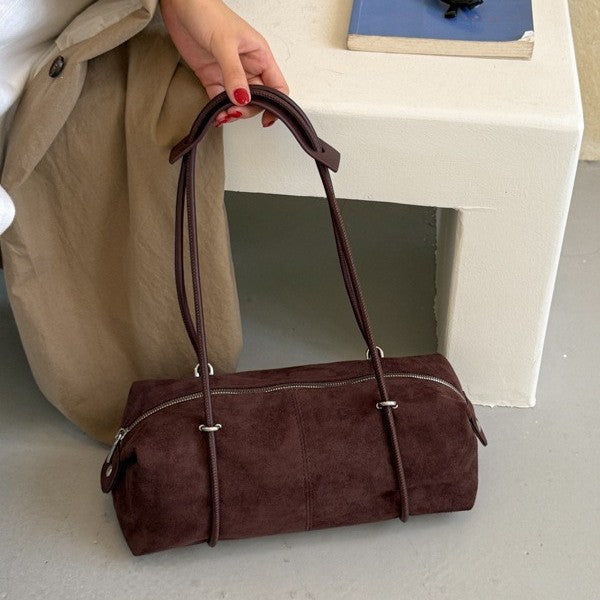 Soft Suede Barrel Shoulder Bag with Metal Accents and Zip Closure