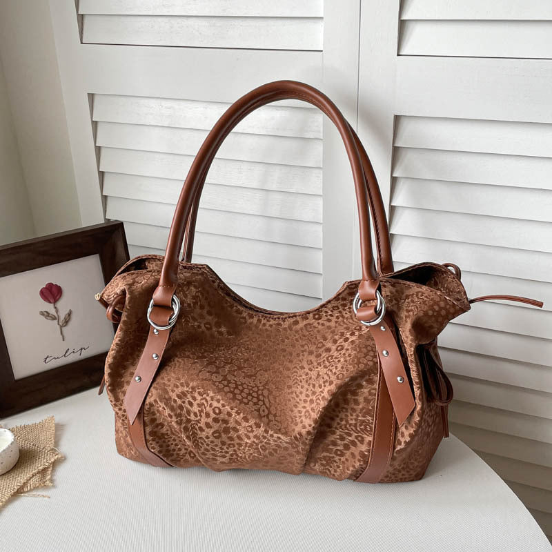 Retro Inspired Shoulder Bag with Elevated Texture
