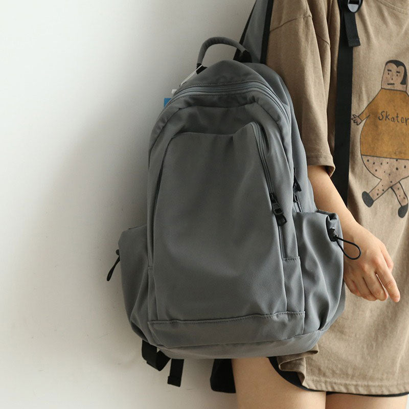 New Korean Style Solid Color Versatile Backpack Large Capacity Female Junior High School Student College Student Bag Casual Travel Backpack For Men