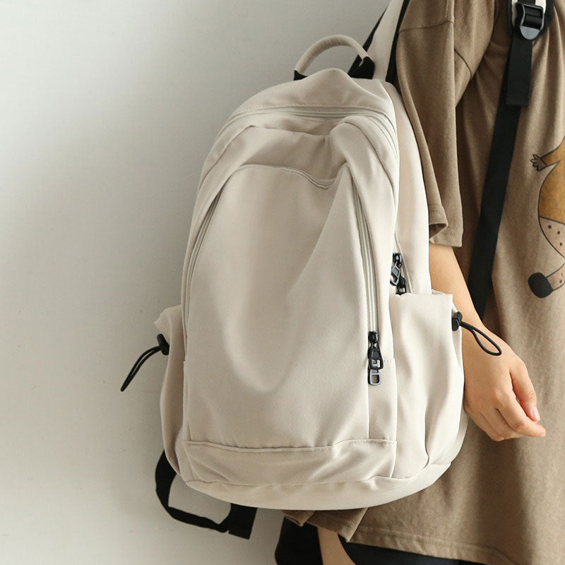New Korean Style Solid Color Versatile Backpack Large Capacity Female Junior High School Student College Student Bag Casual Travel Backpack For Men