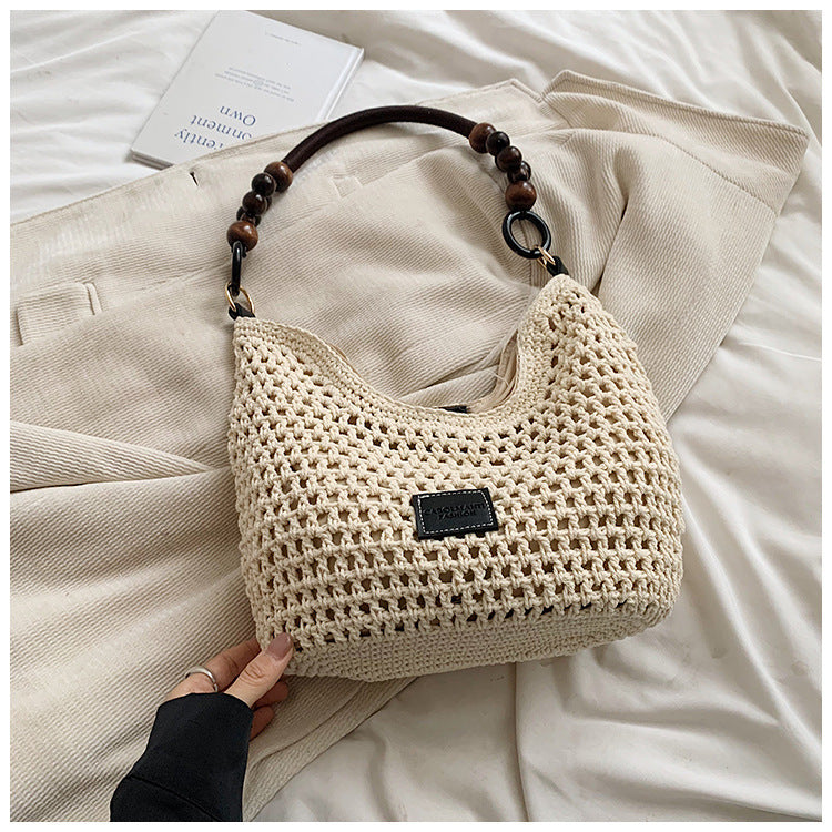Seaside Vacation Beach Woven Bag For Women 2026 New Hollow Knitted Handbag Large Capacity Single Shoulder Armpit Bag