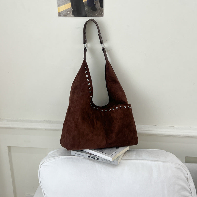 Soft Suede Hobo Bag with Bold Eyelet Accents