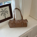 Vintage East-West Barrel Shoulder Bag with Buckle Details