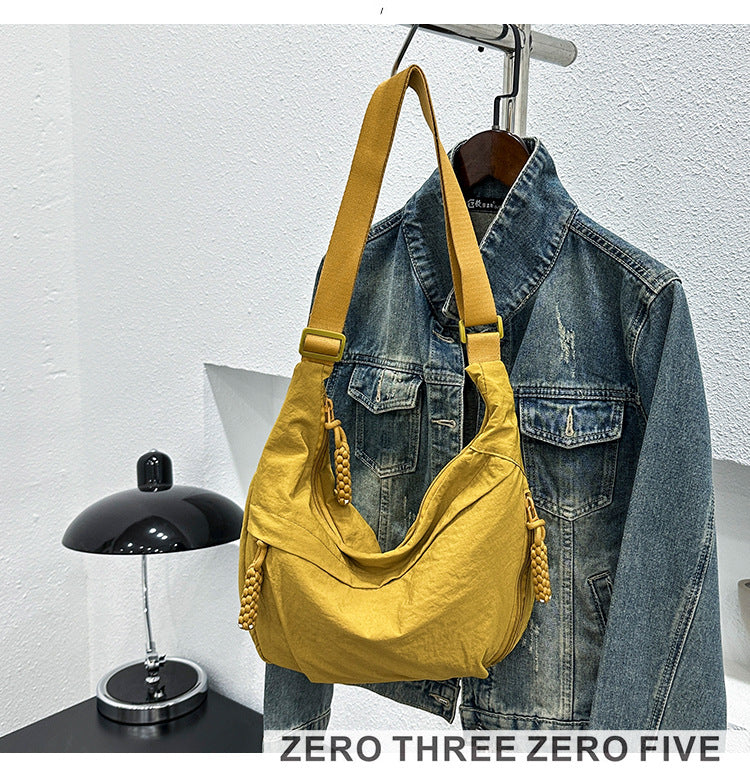 Textured Nylon Dumpling Crossbody Bag