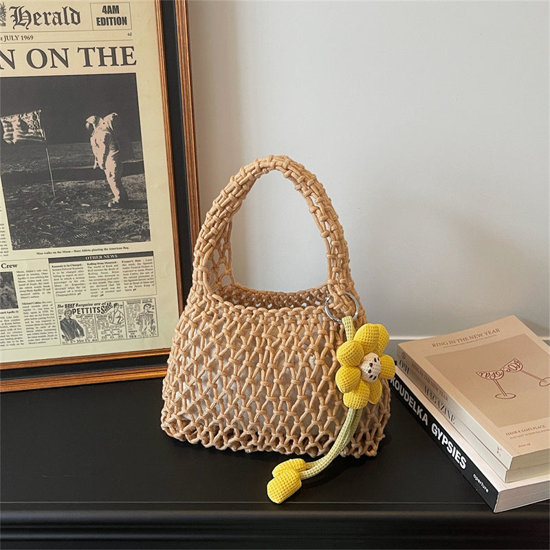 2026 New Korean Unique Hollow Mesh Wristlet Fashion Beach Handbag