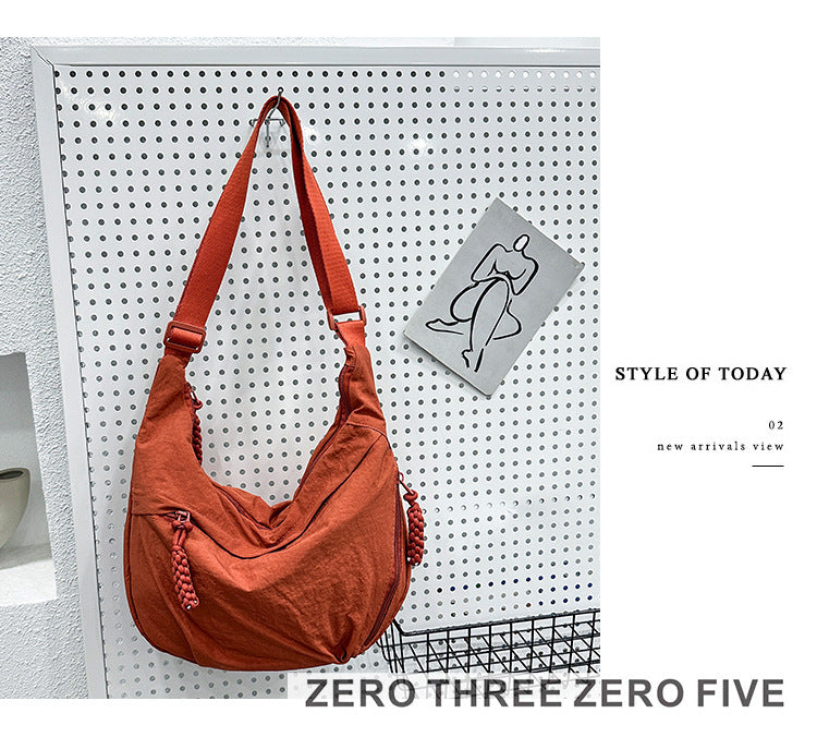 Textured Nylon Dumpling Crossbody Bag