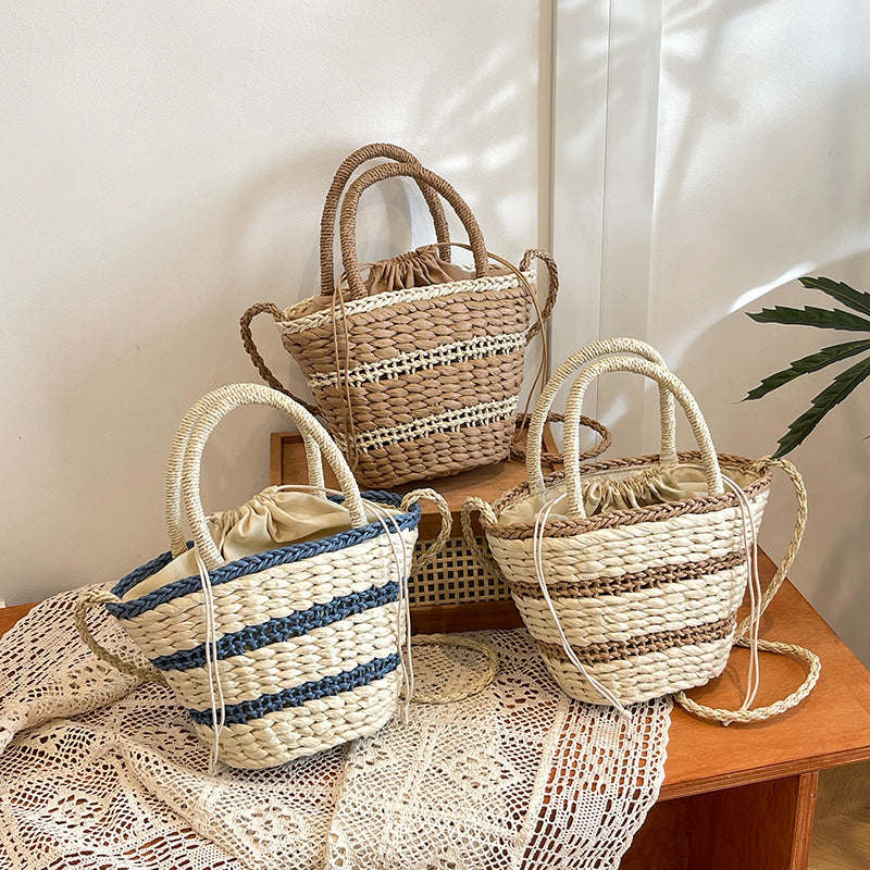 Women 2026 Summer New Vintage Straw Unique Handheld Woven Bucket Bag