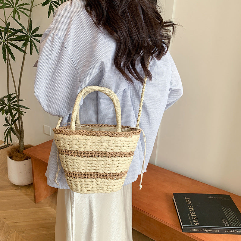Women 2026 Summer New Vintage Straw Unique Handheld Woven Bucket Bag