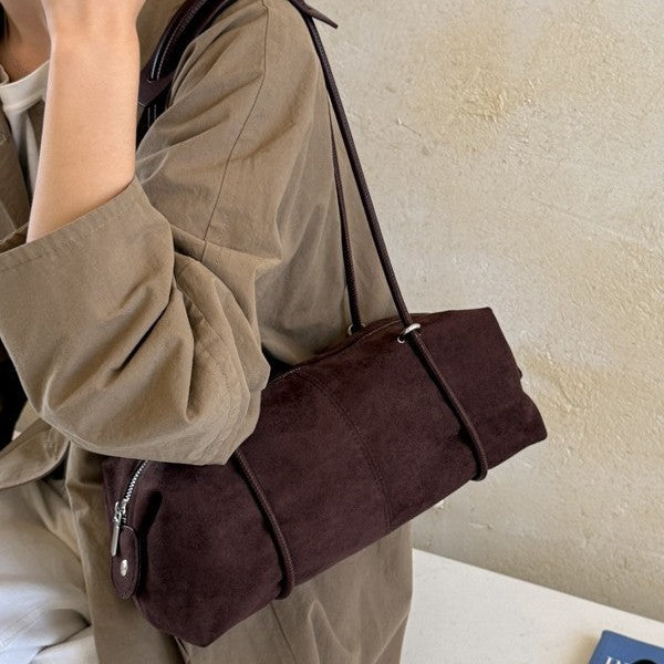 Soft Suede Barrel Shoulder Bag with Metal Accents and Zip Closure