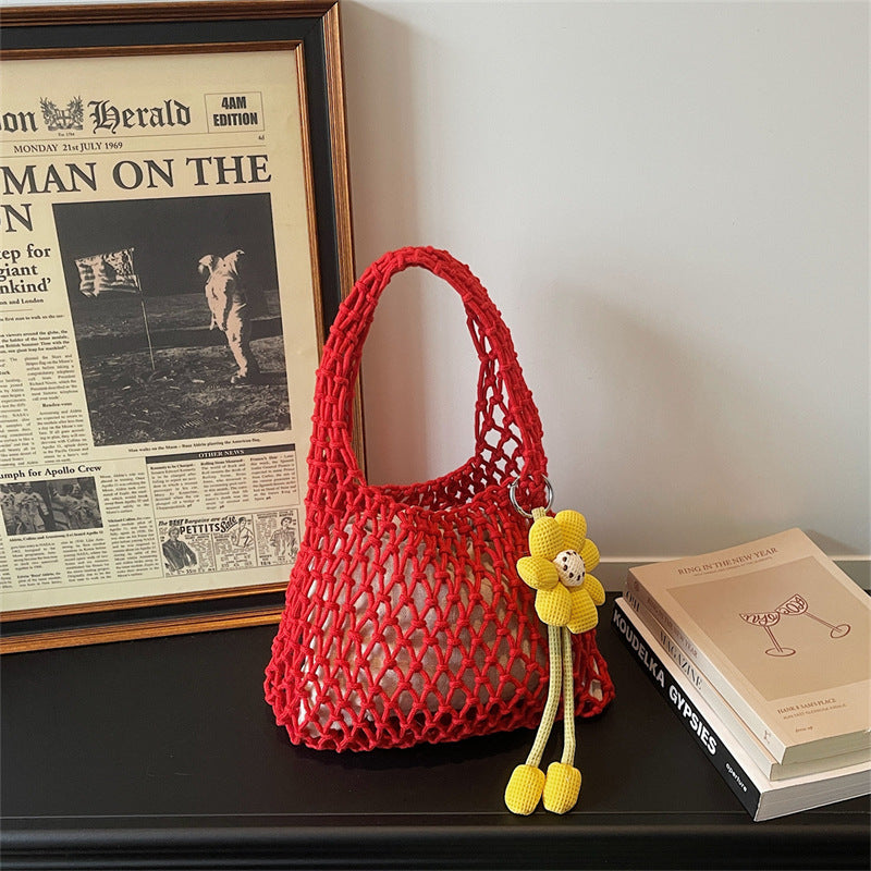2026 New Korean Unique Hollow Mesh Wristlet Fashion Beach Handbag
