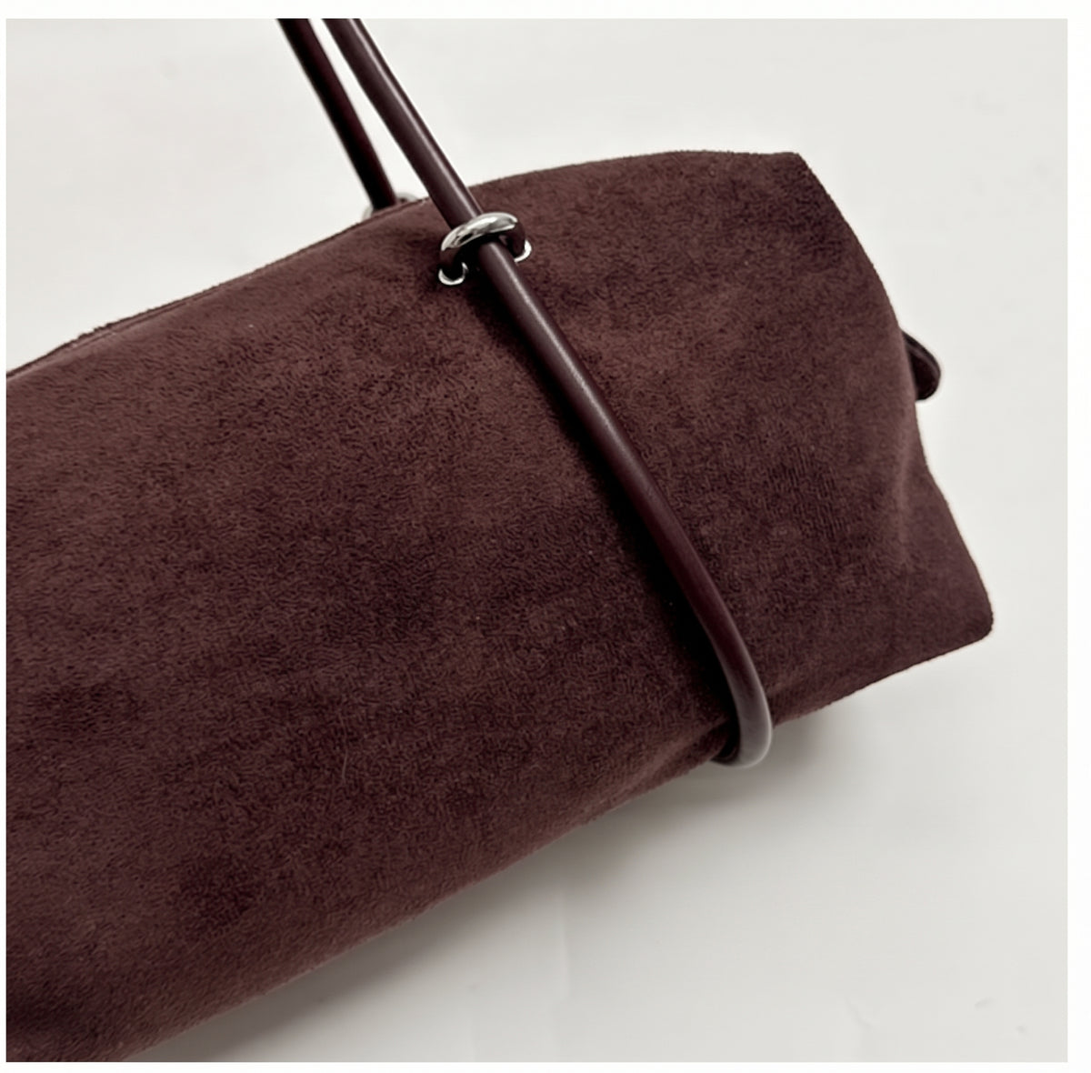 Soft Suede Barrel Shoulder Bag with Metal Accents and Zip Closure