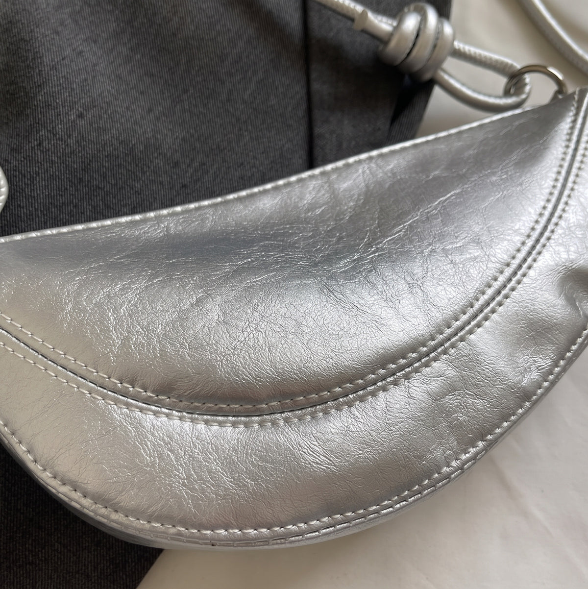 Mini Crescent Crossbody Bag with Knotted Strap Detail