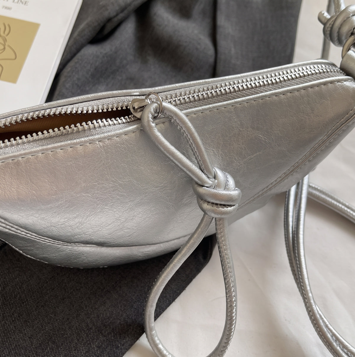Mini Crescent Crossbody Bag with Knotted Strap Detail