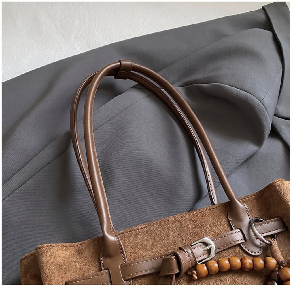 Soft Textured Belted Shoulder Bag with Beaded Charm