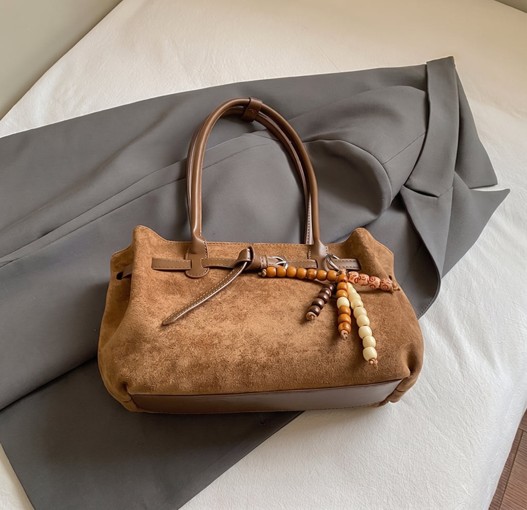Soft Textured Belted Shoulder Bag with Beaded Charm