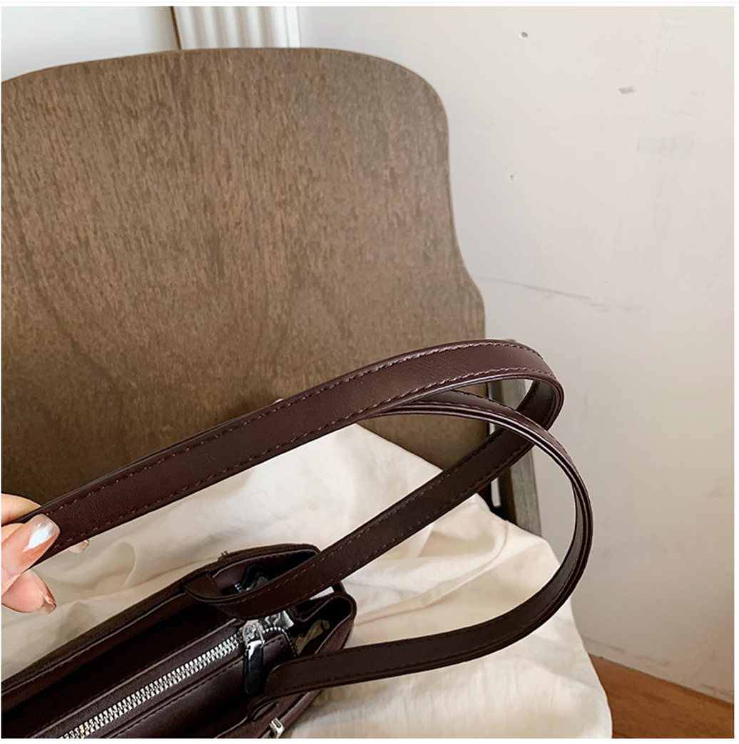 Elegant Suede Shoulder Bag with Buckle Detail