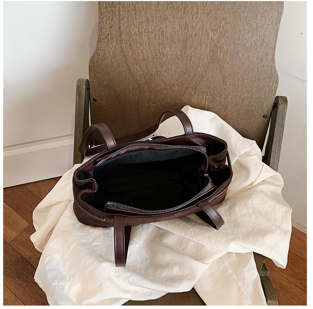 Elegant Suede Shoulder Bag with Buckle Detail
